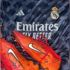 Nike Zoom Mercurial Superfly 9 Elite MDS FG Soccer Cleats.    Red/Orange cleats